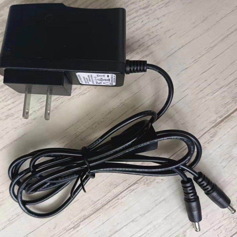 Caricabatterie standard statunitense 8.4V 1.2A con due teste a corrente continua per batterie a guanto riscaldato